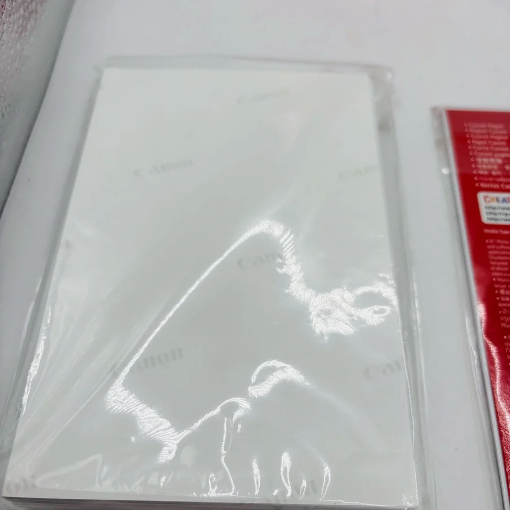 Canon Photo Paper Plus Glossy II and Photo Paper Glossy Pack.